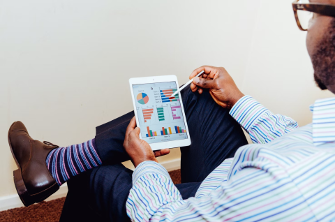 Image of man using tablet