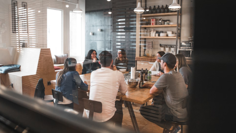 Image of people sitting at a table
