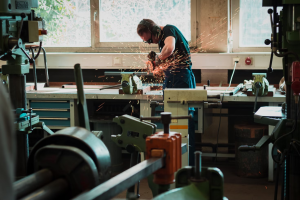 Image of man building something